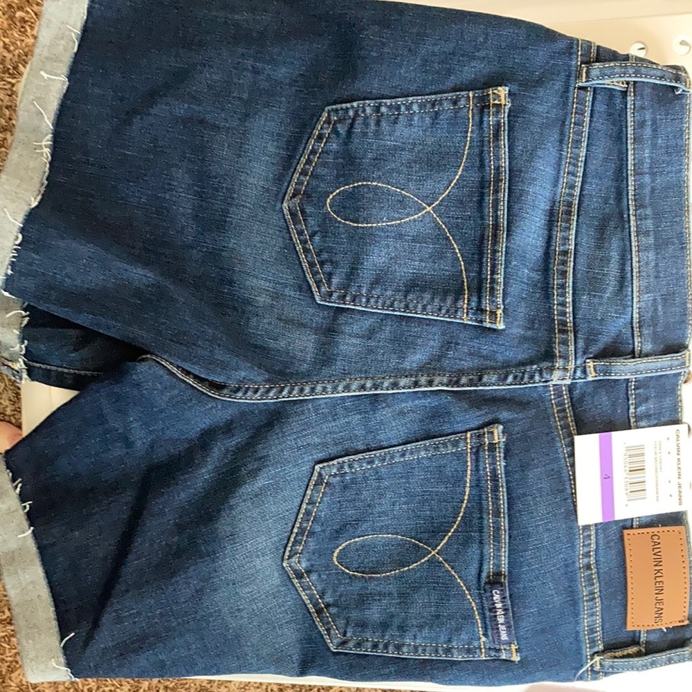 Calvin Klein Jean shorts size 4 new with tags